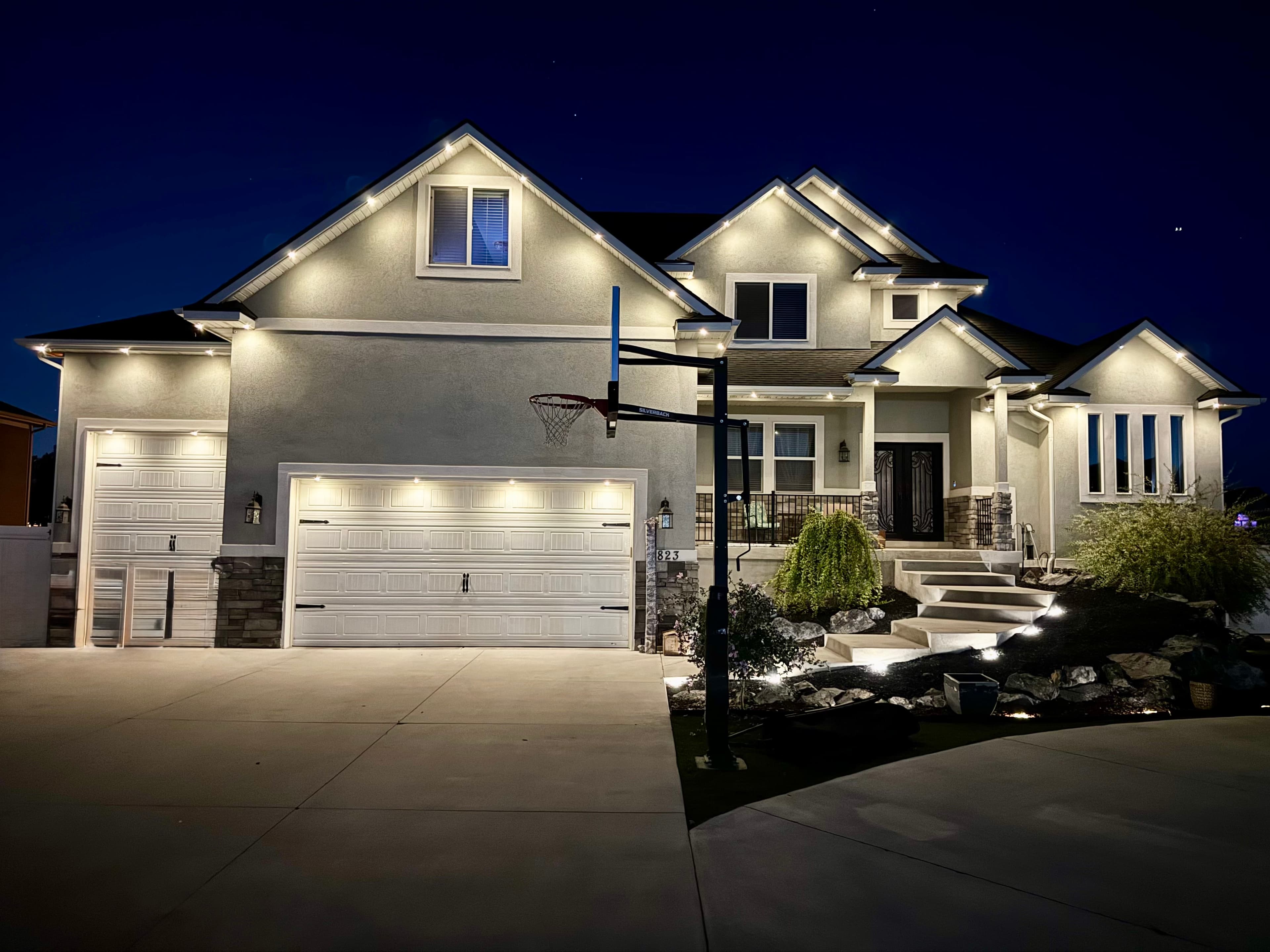 Smart outdoor LED lighting controlled via app on a home (TruLight network install)